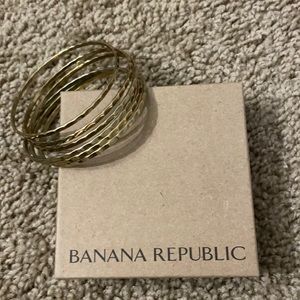 6 gold hammered bangles